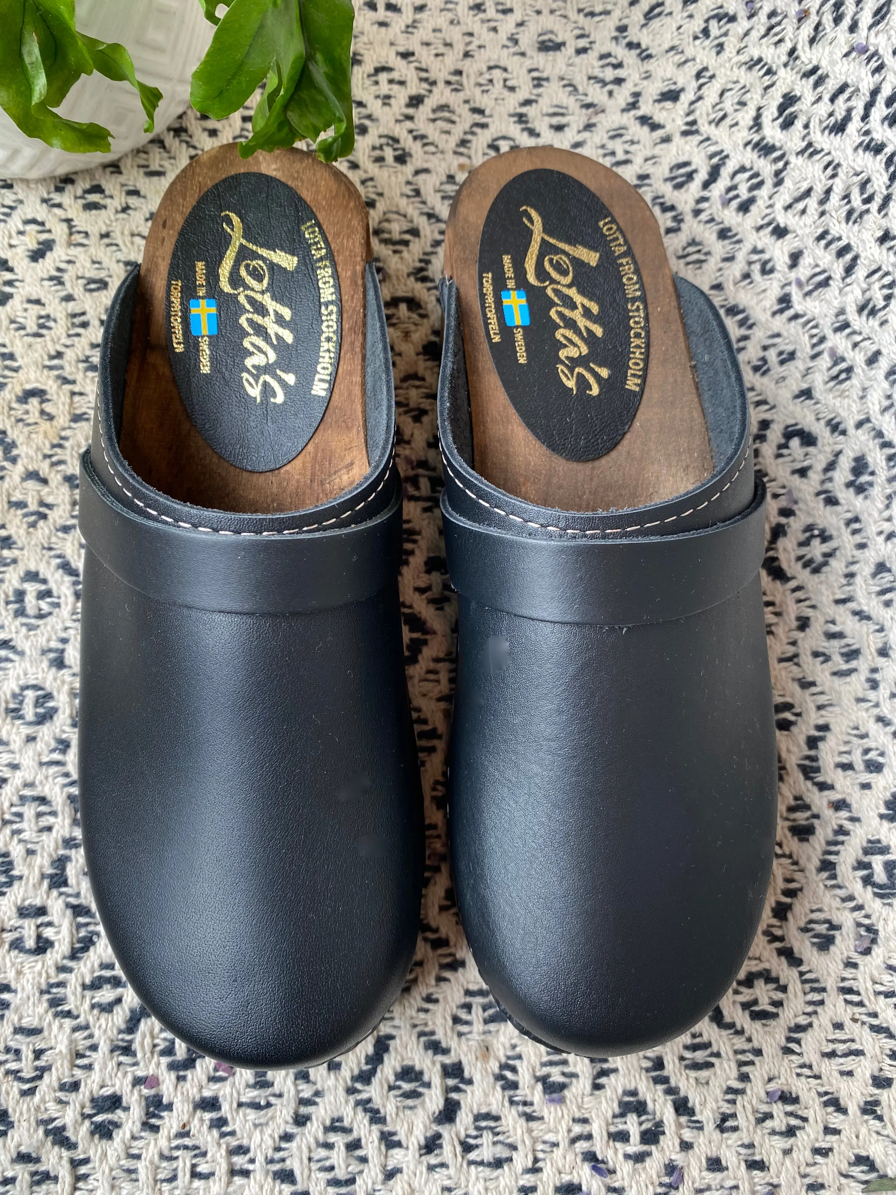 Classic Black Clogs on Brown Base